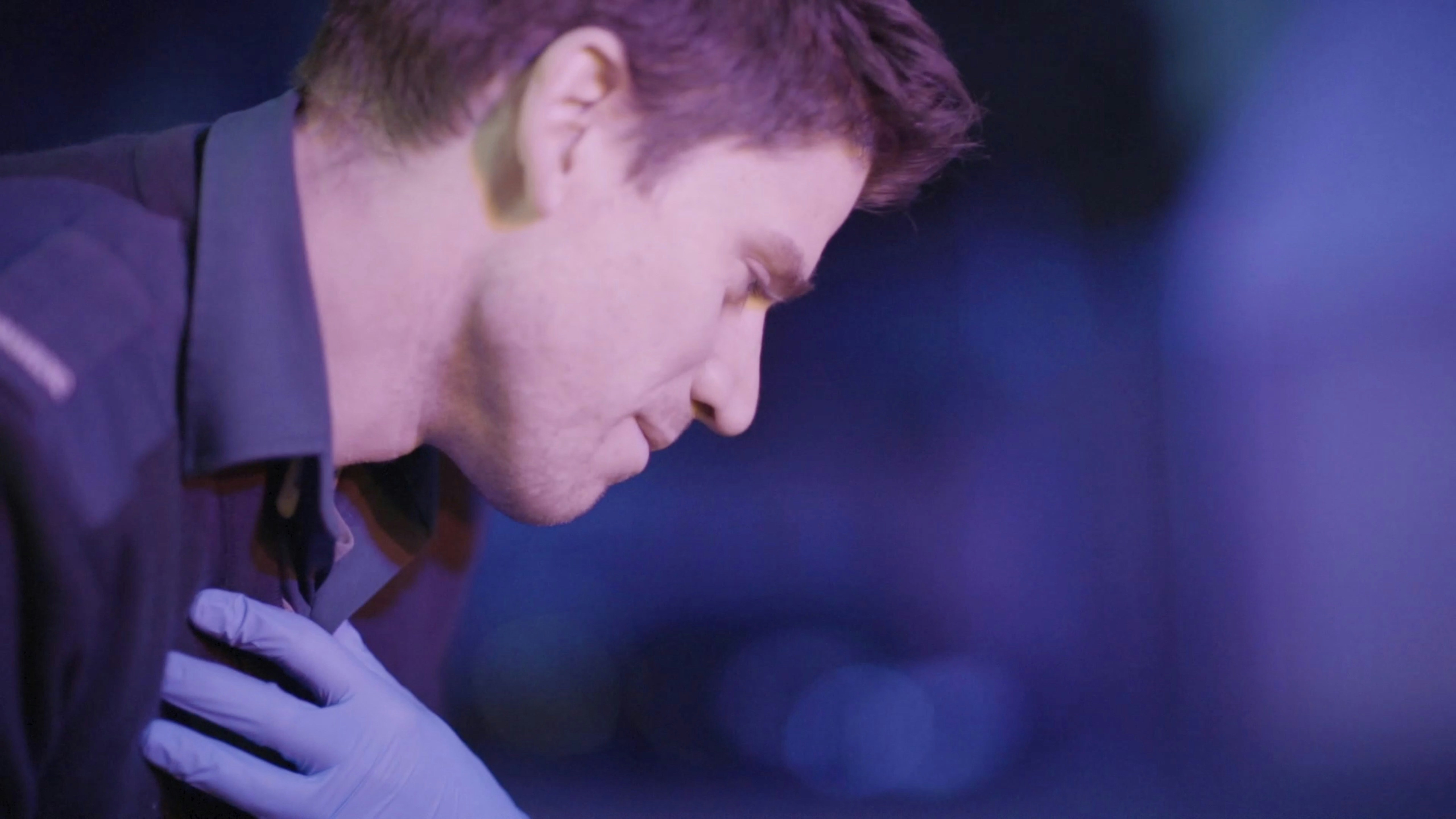 man in white collared shirt