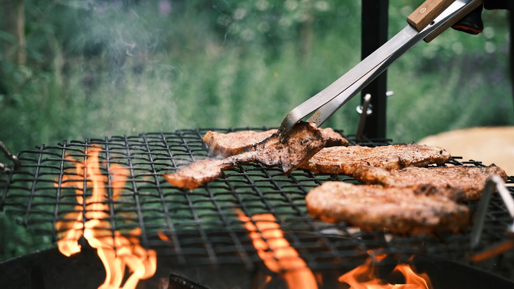 grilled meat on charcoal grill