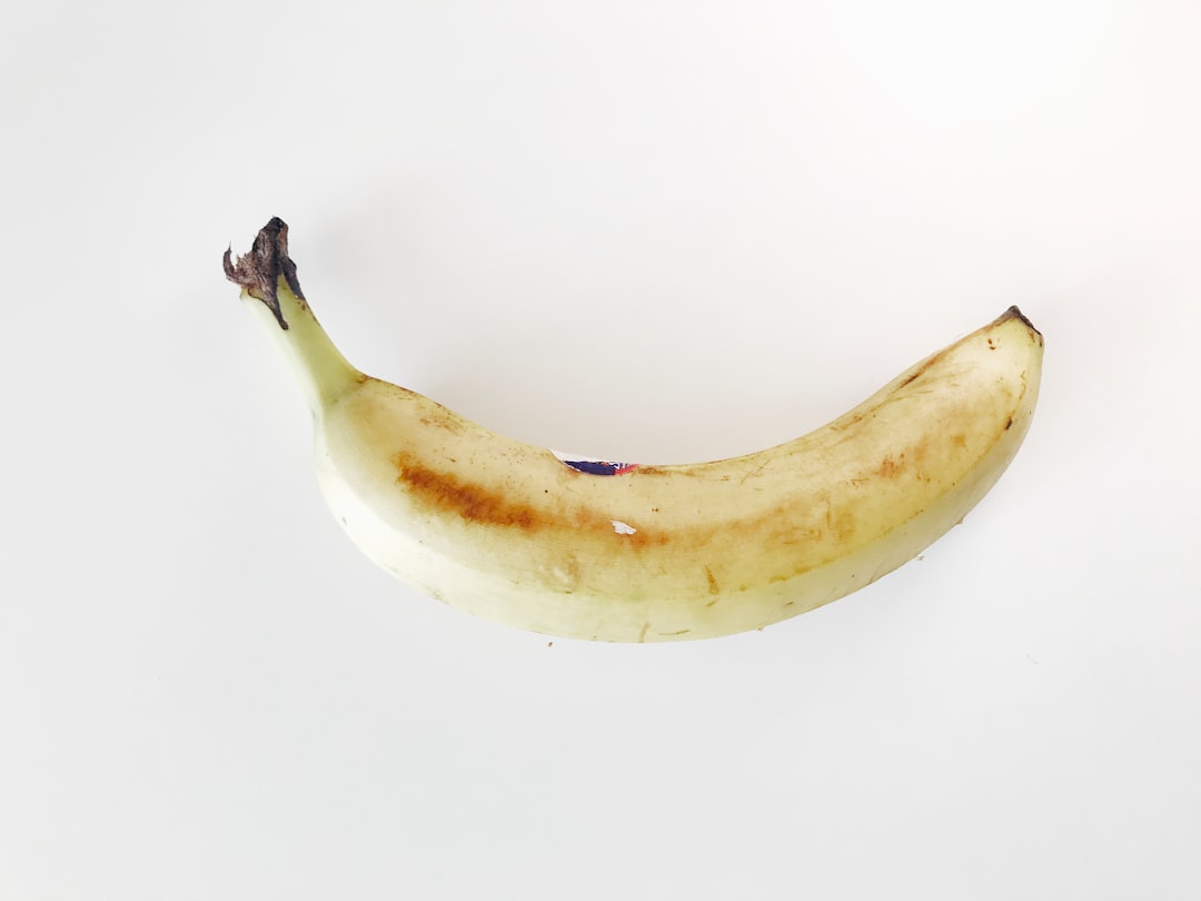 yellow banana on white table