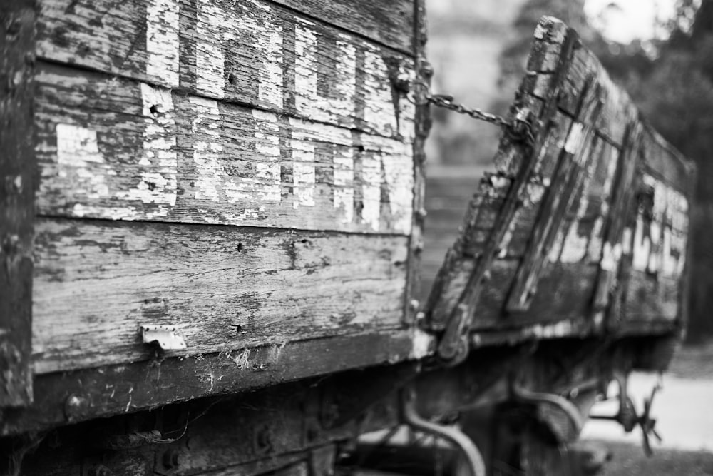 grayscale photo of wooden board