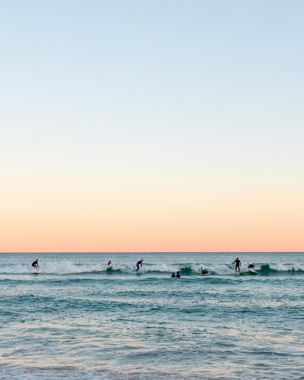 people on beach during daytime