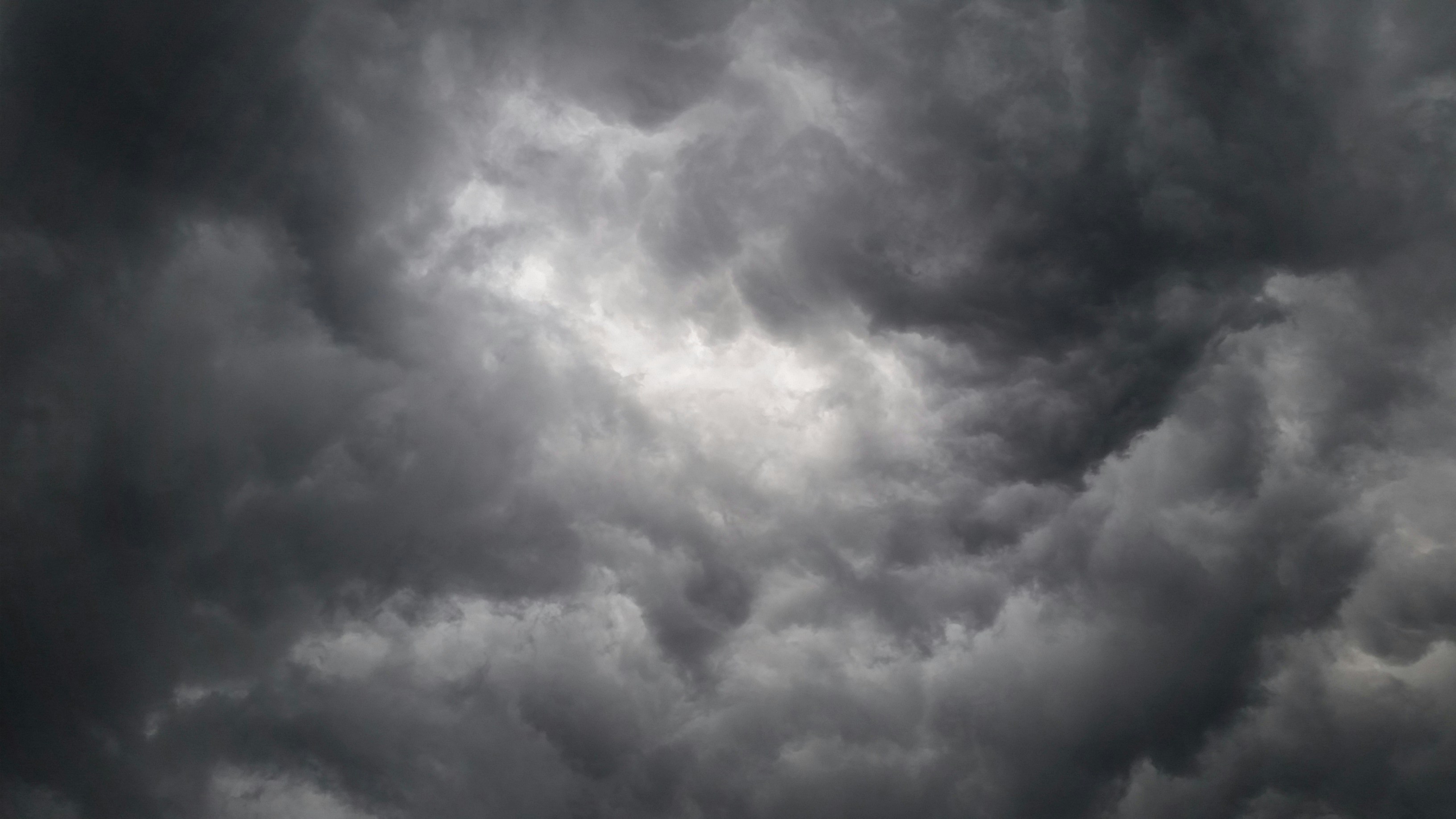 Storm clouds atmospheric pressure weather system dramatic dark sky, turbulent deep shadows