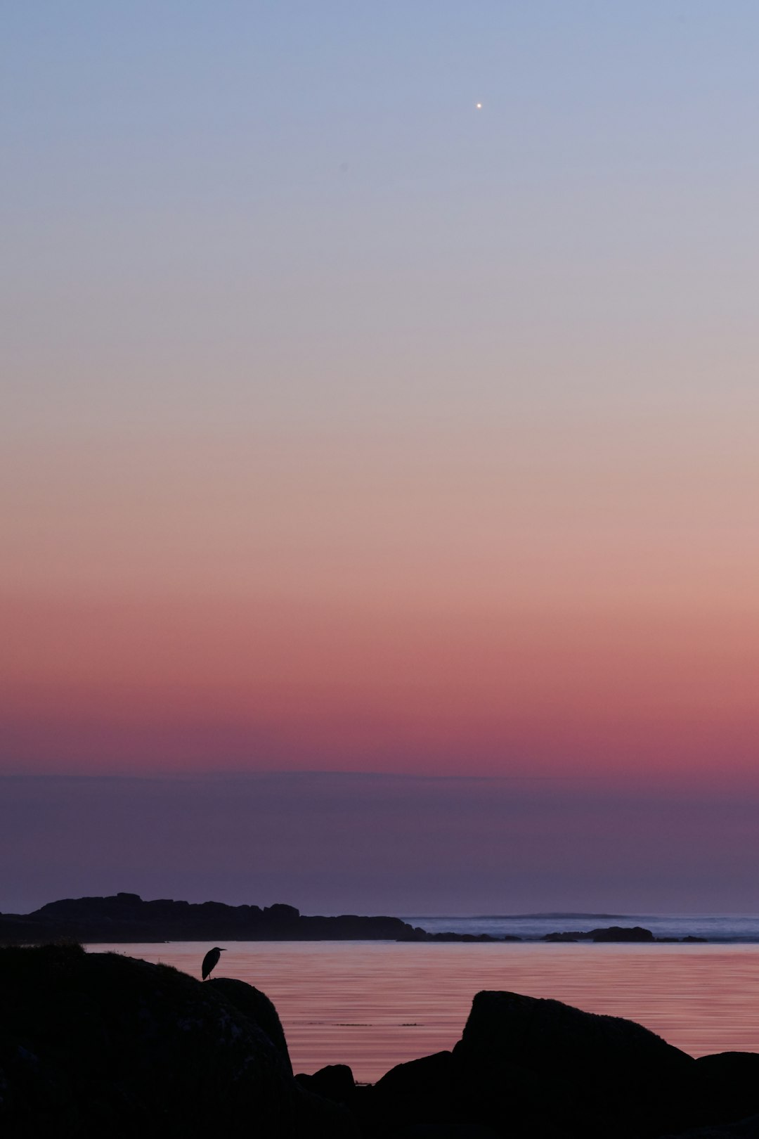 silhouette of mountains during sunset