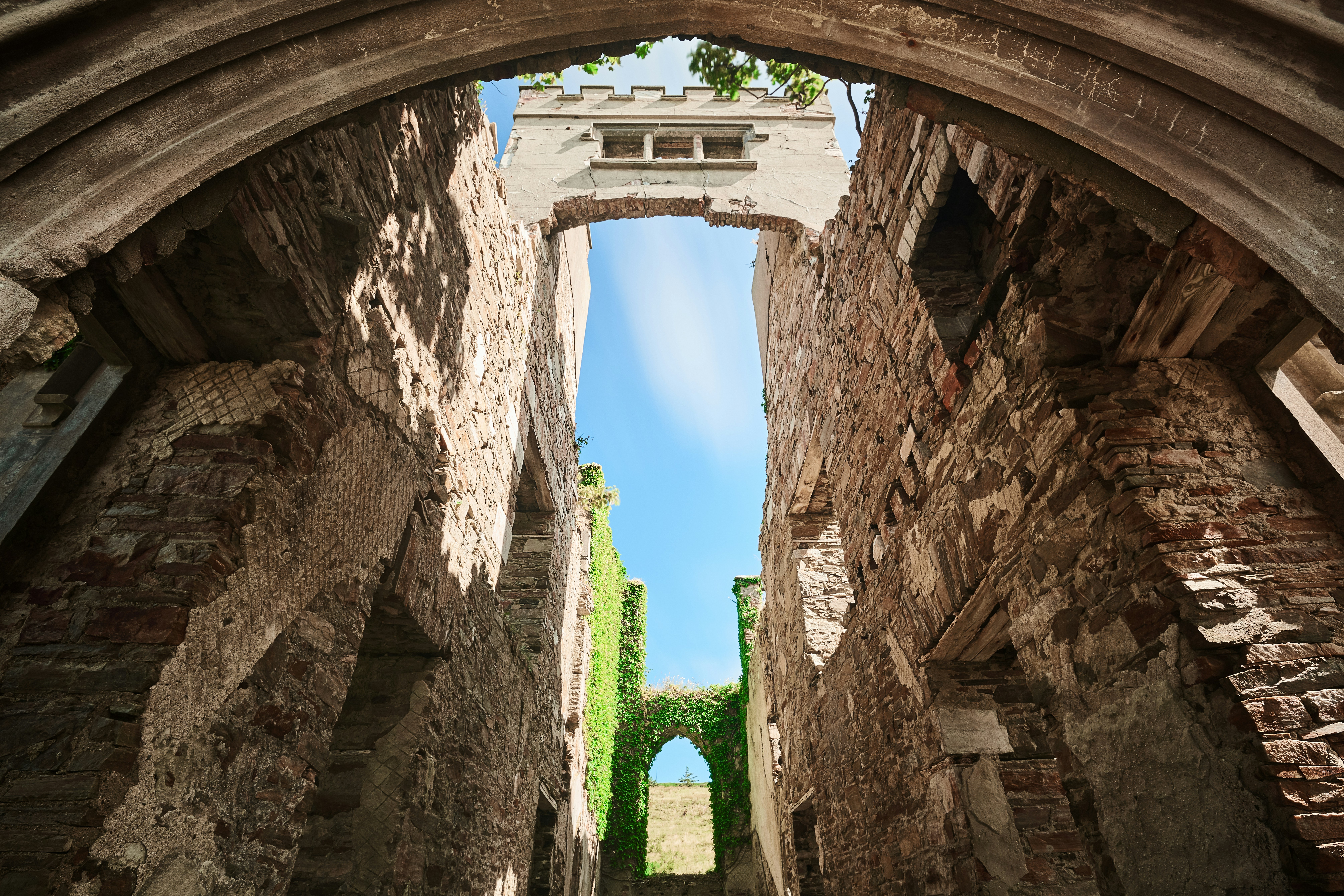 brown concrete arch during daytime
