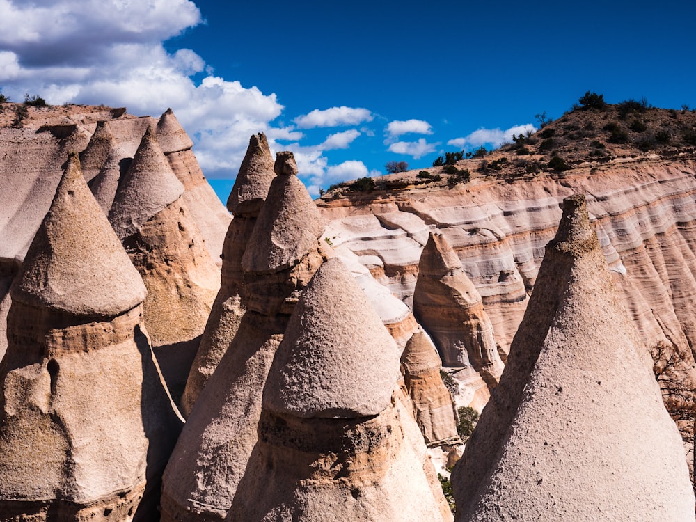 brown rock formation under blue sky during daytime