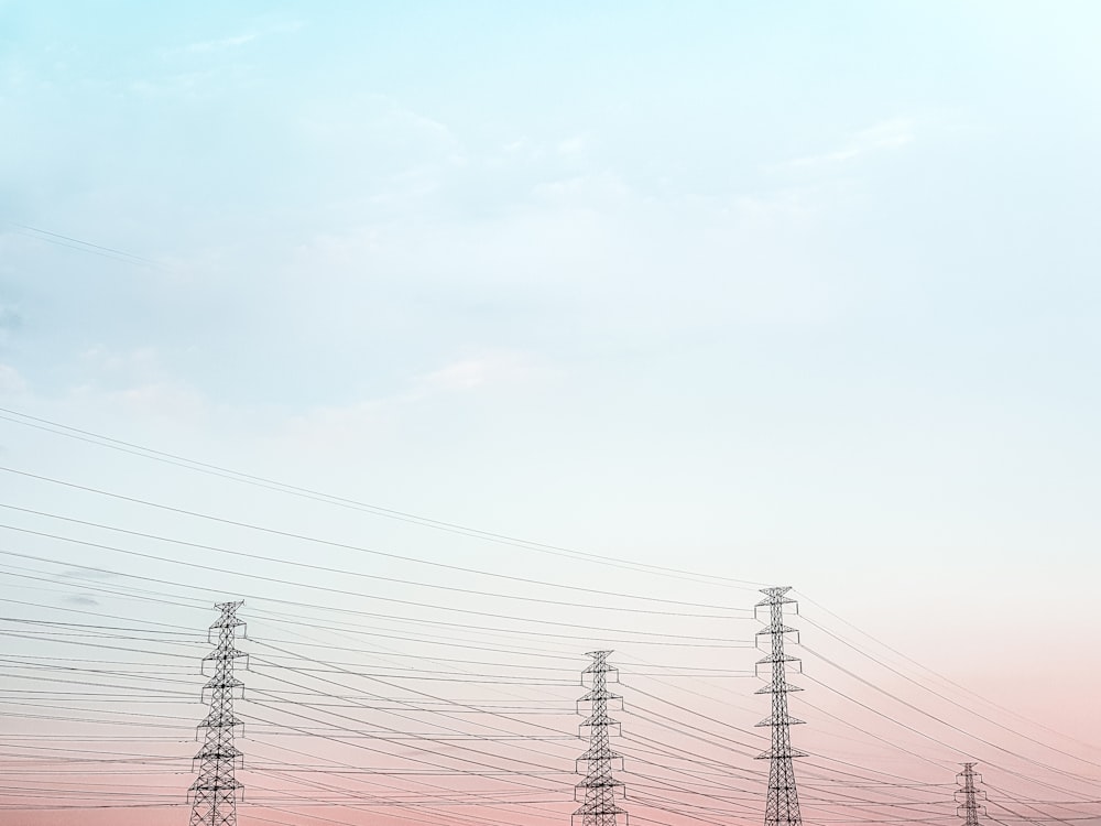 black electric wires under white sky during daytime