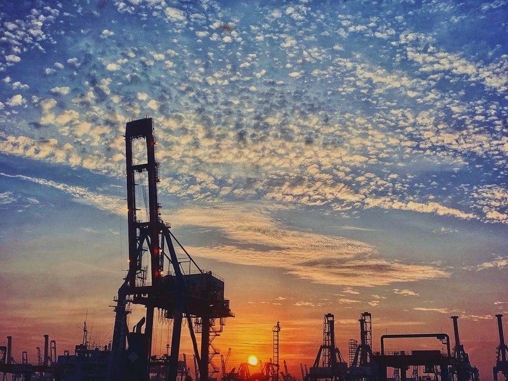 silhouette of building during sunset