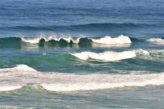 ocean waves crashing on shore during daytime in Keurboomstrand South Africa