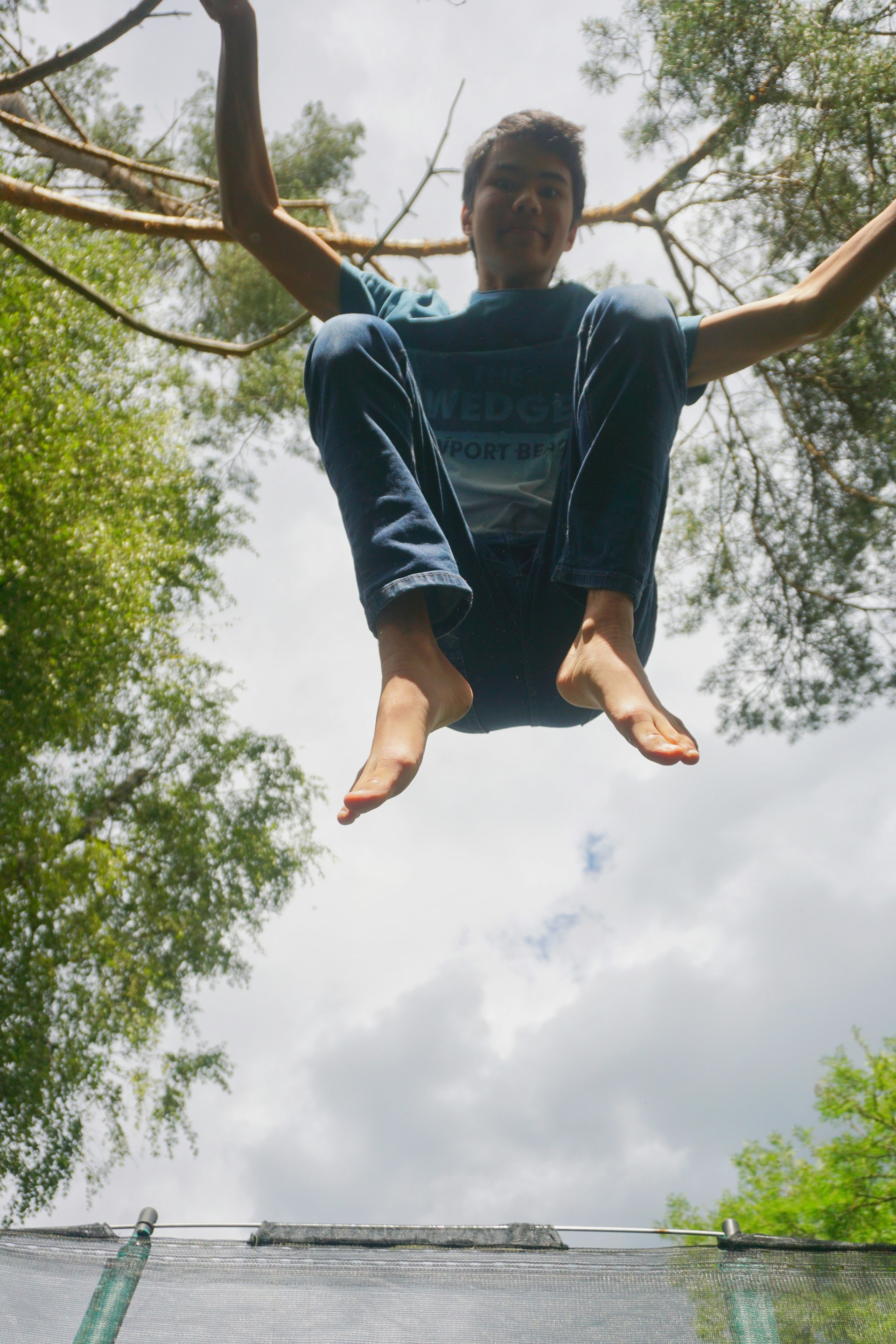 woman wearing yellow long-sleeved dress under white clouds and blue sky during daytime