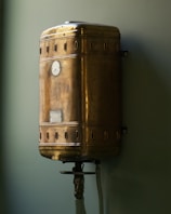 brown steel container on white wall