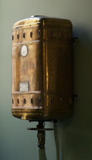 brown steel container on white wall