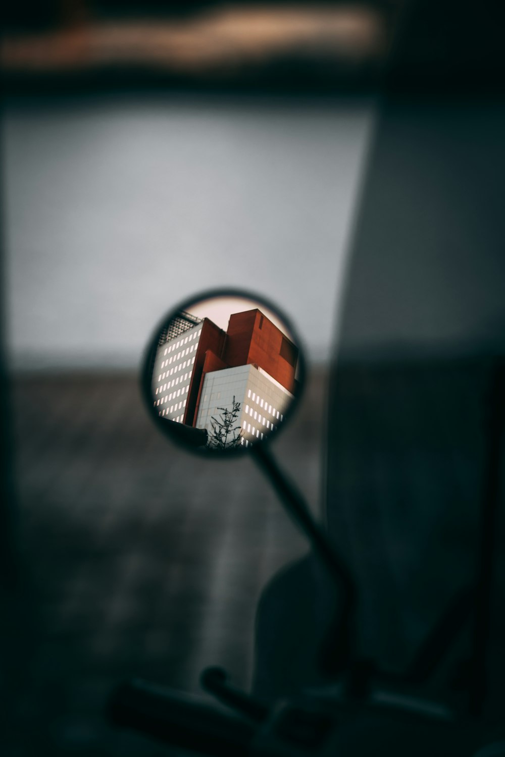 black magnifying glass on black table