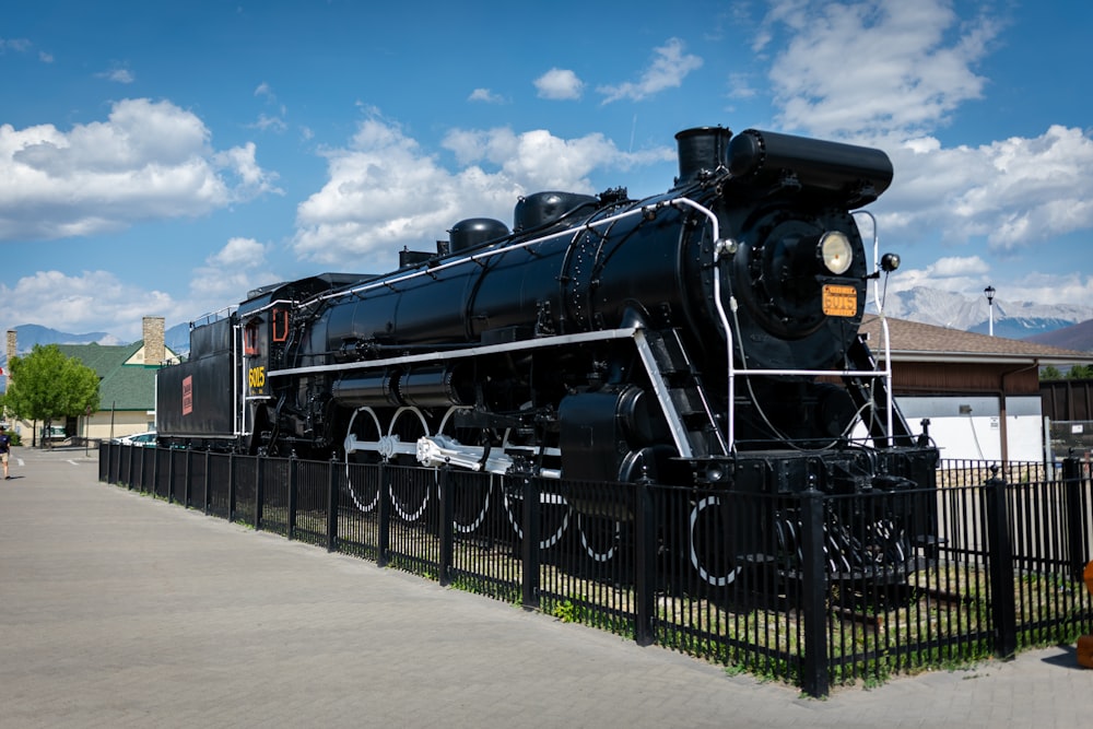 black and yellow train under blue sky during daytime