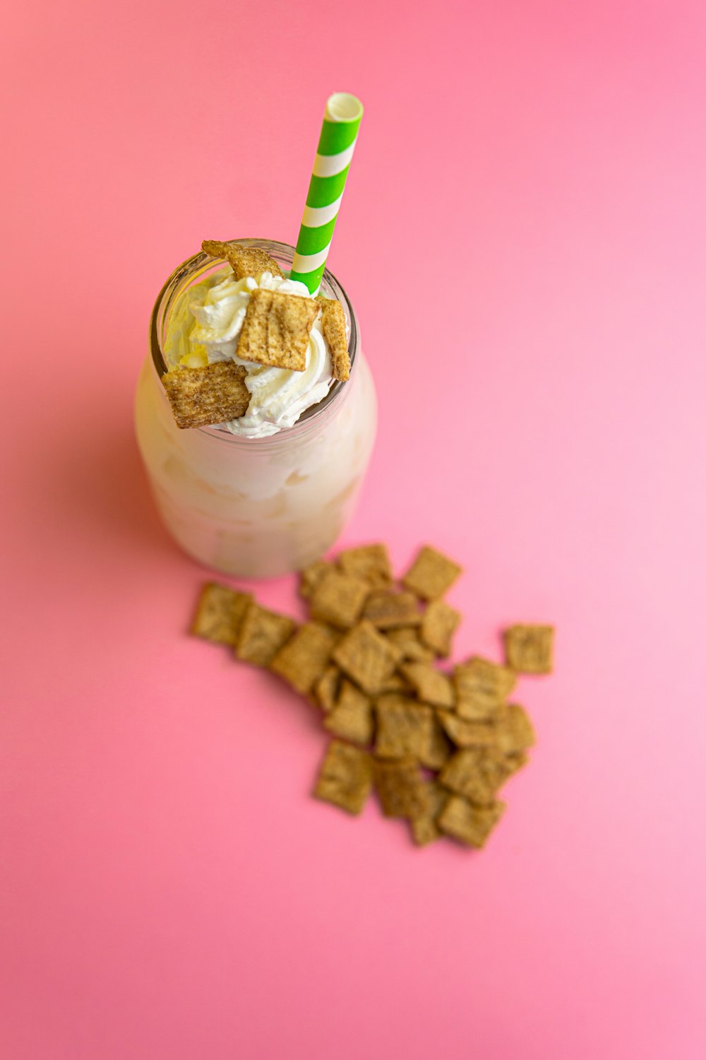 brown and white ice cream in clear glass cup