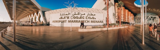 people walking on the street during daytime in Menara Morocco