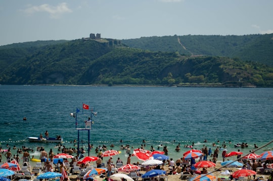 people on beach during daytime in Rumeli Kavağı Turkey