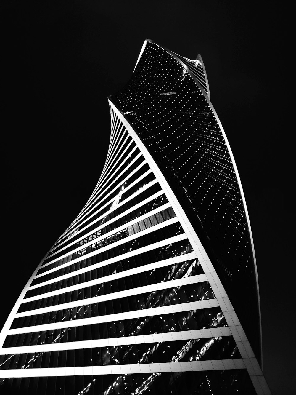 grayscale photo of high rise building