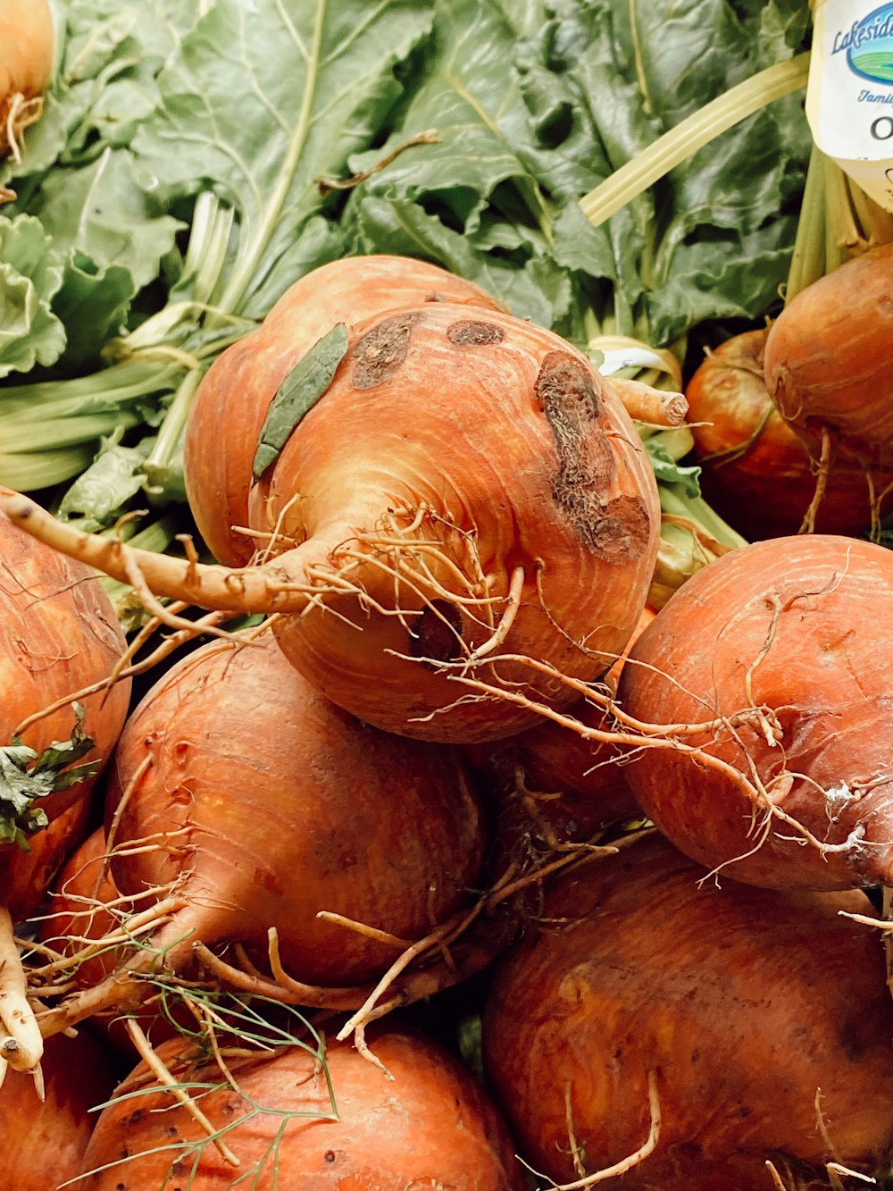 red onions on brown wooden table