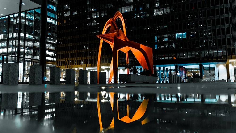 orange and black building during night time