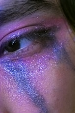 persons eye in close up photography