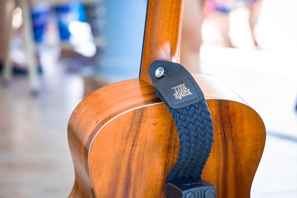 black strap on brown wooden table