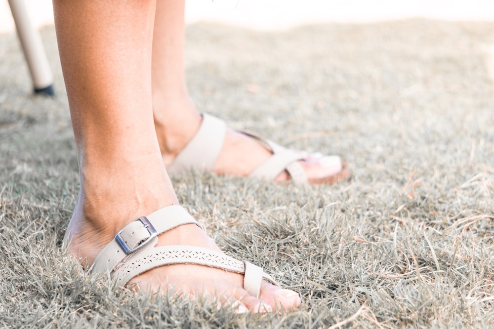 woman in white leather sandals