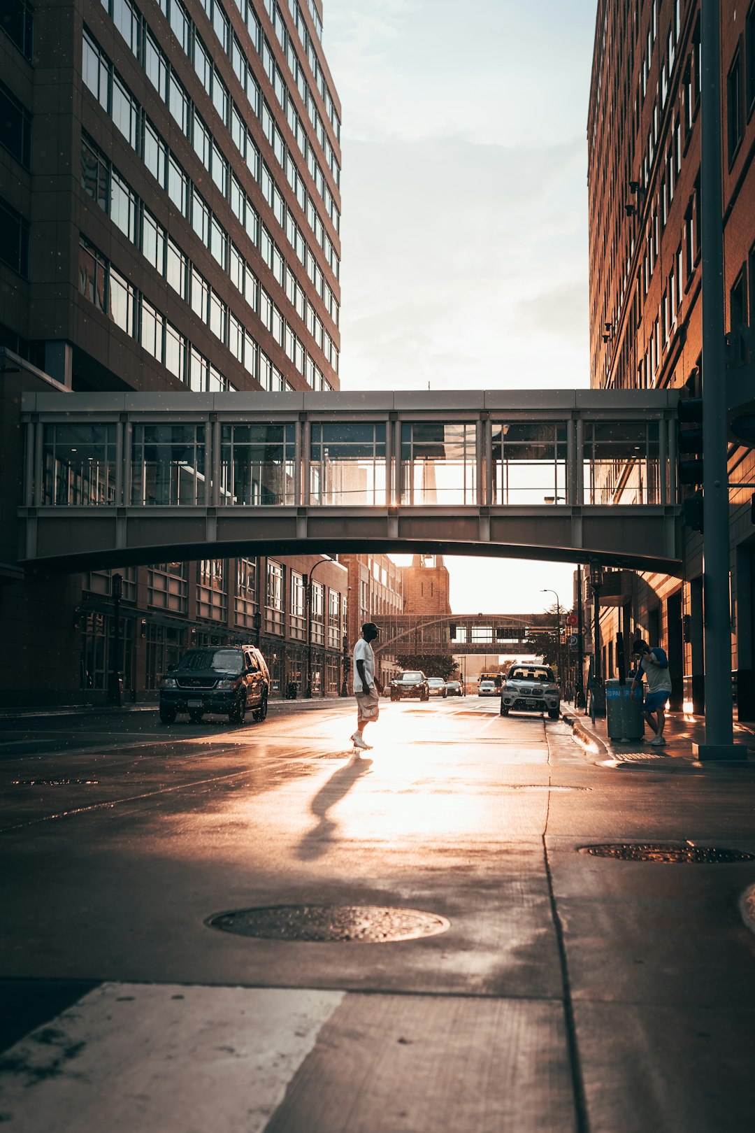 cars parked on side of the road near building during daytime