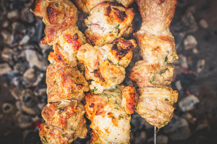 Tandoori skewers roasting over open flame