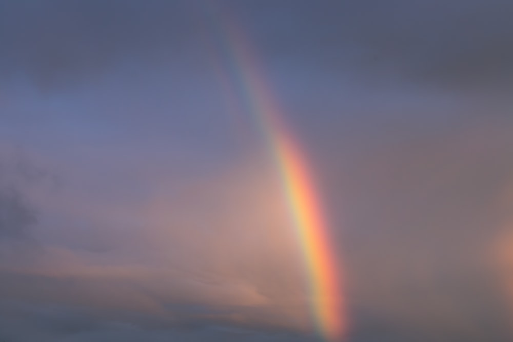 sun rays over clouds during daytime