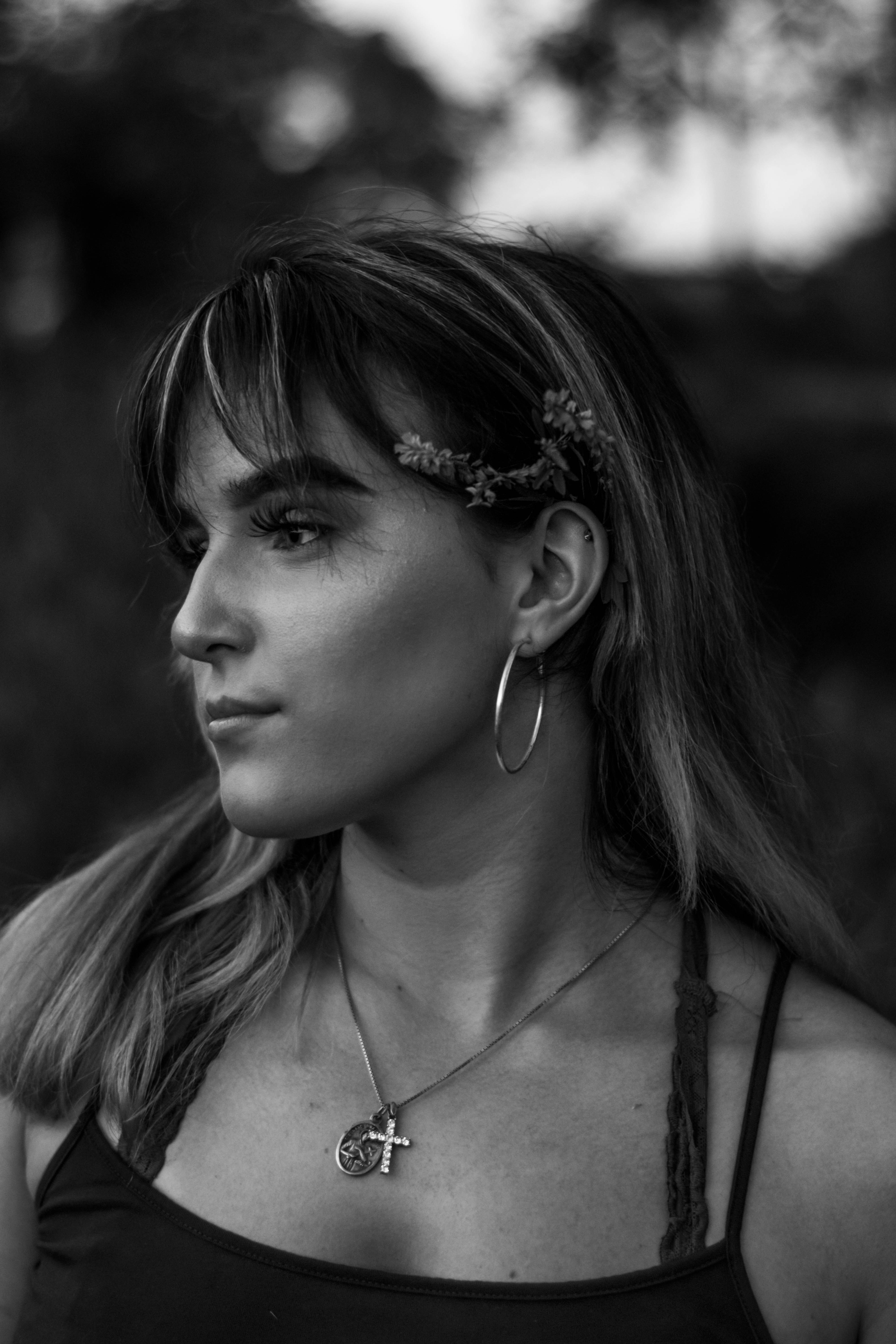 grayscale photo of woman with butterfly headband