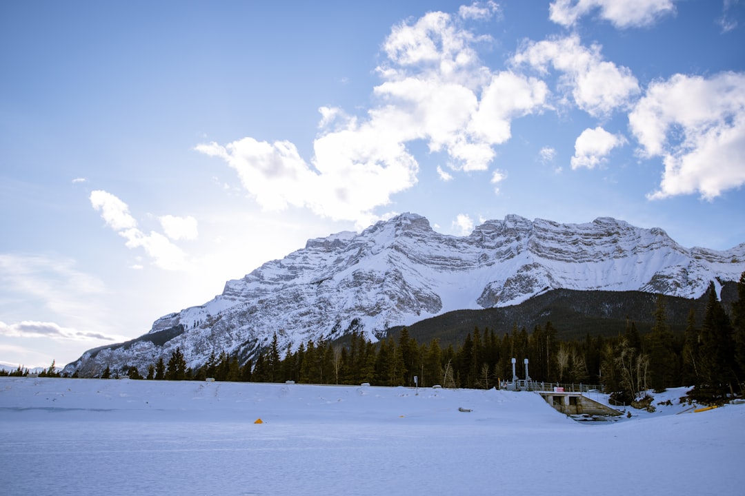 travelers stories about Mountain range in Lake Minnewanka, Canada