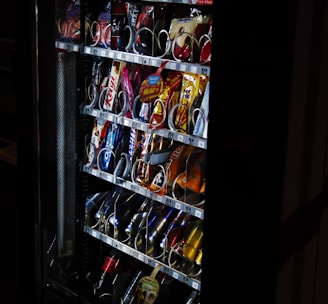 black and red coca cola vending machine