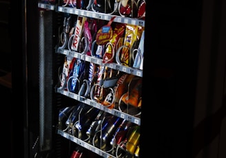 black and red coca cola vending machine