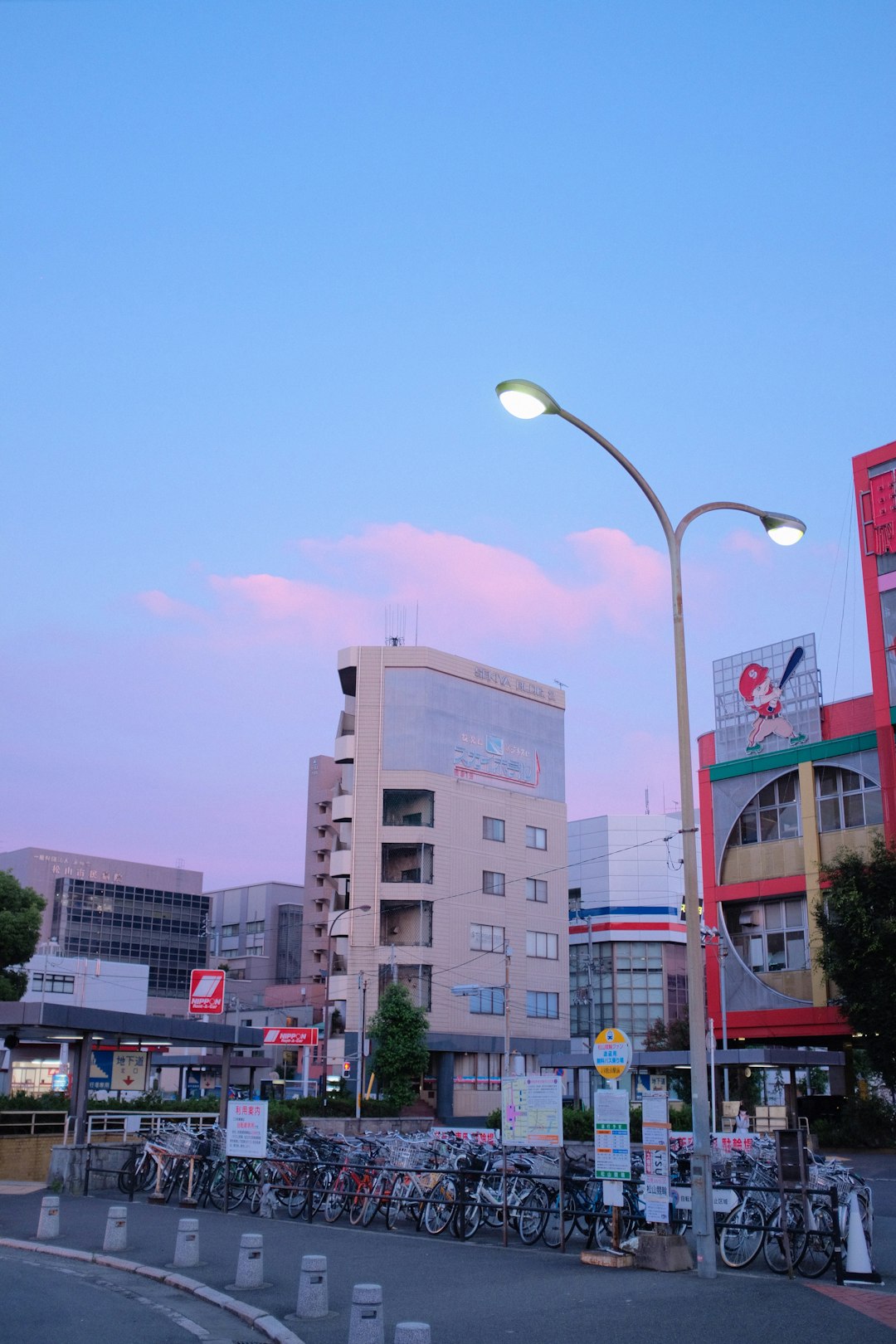 white concrete building near street light during daytime