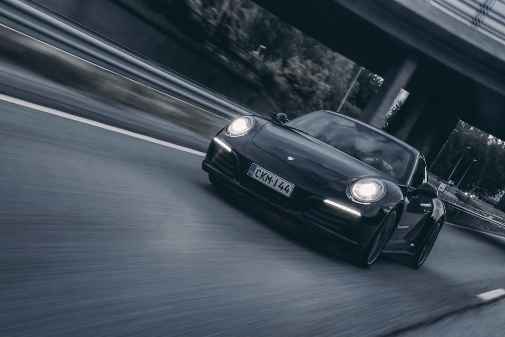 black mercedes benz coupe on road during night time