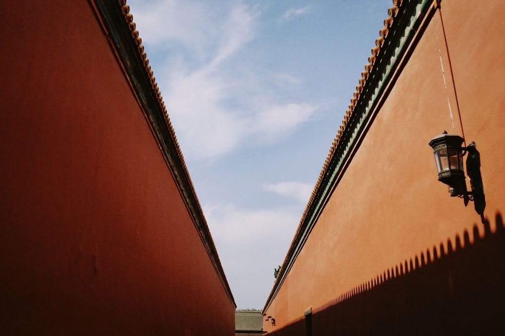 red and brown concrete building under blue sky during daytime