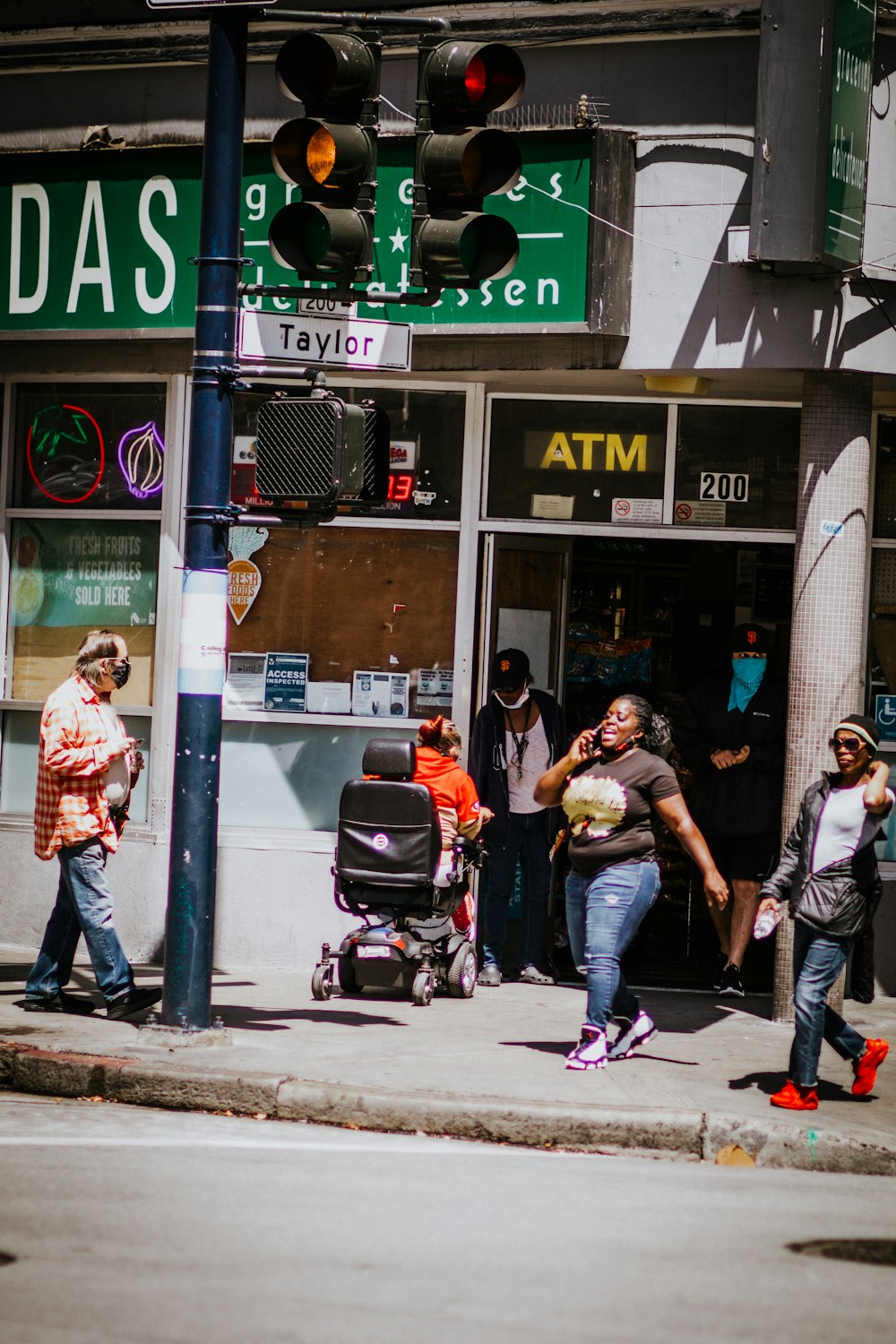 people walking on sidewalk during daytime