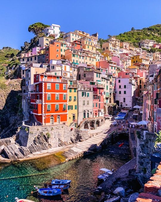 houses near body of water during daytime in Parco Nazionale delle Cinque Terre Italy