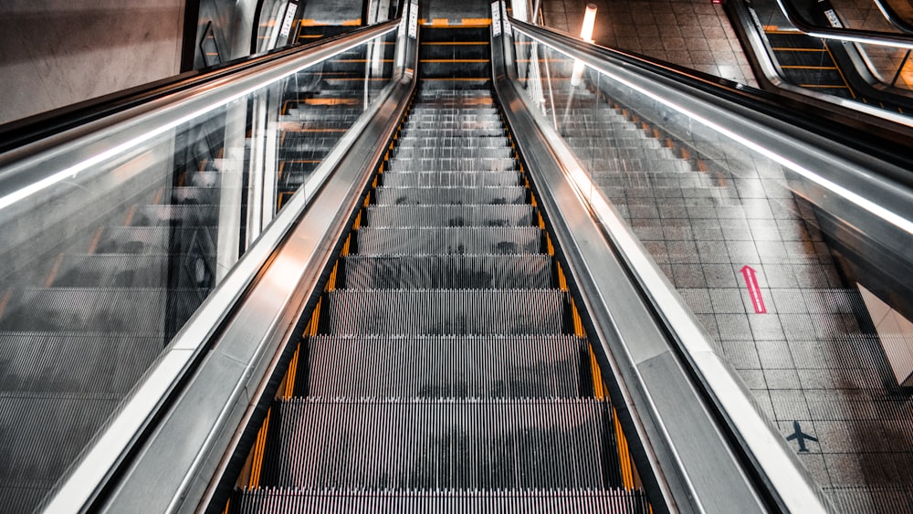 black and silver escalator with no people