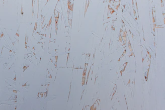 Detailed close-up of wood imitation paintwork on a commercial storefront in Alicante.