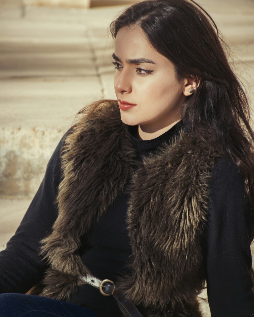 woman in black fur coat