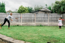 white wooden fence on green grass field