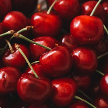 red cherry fruit in close up photography