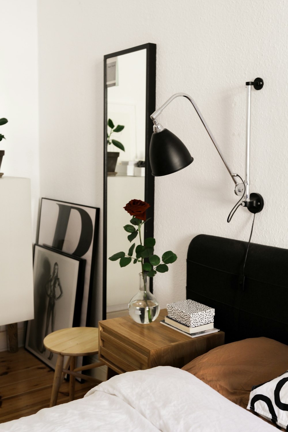 black and silver table lamp on brown wooden table