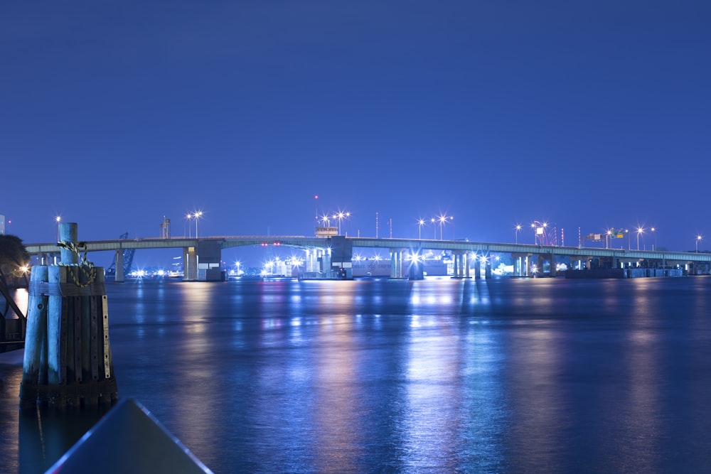 bridge over water during night time