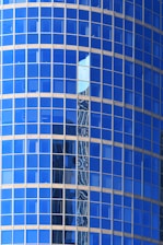 a tall building with a clock on the side of it