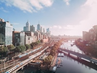 city buildings near body of water during daytime