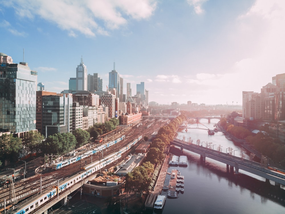 city buildings near body of water during daytime