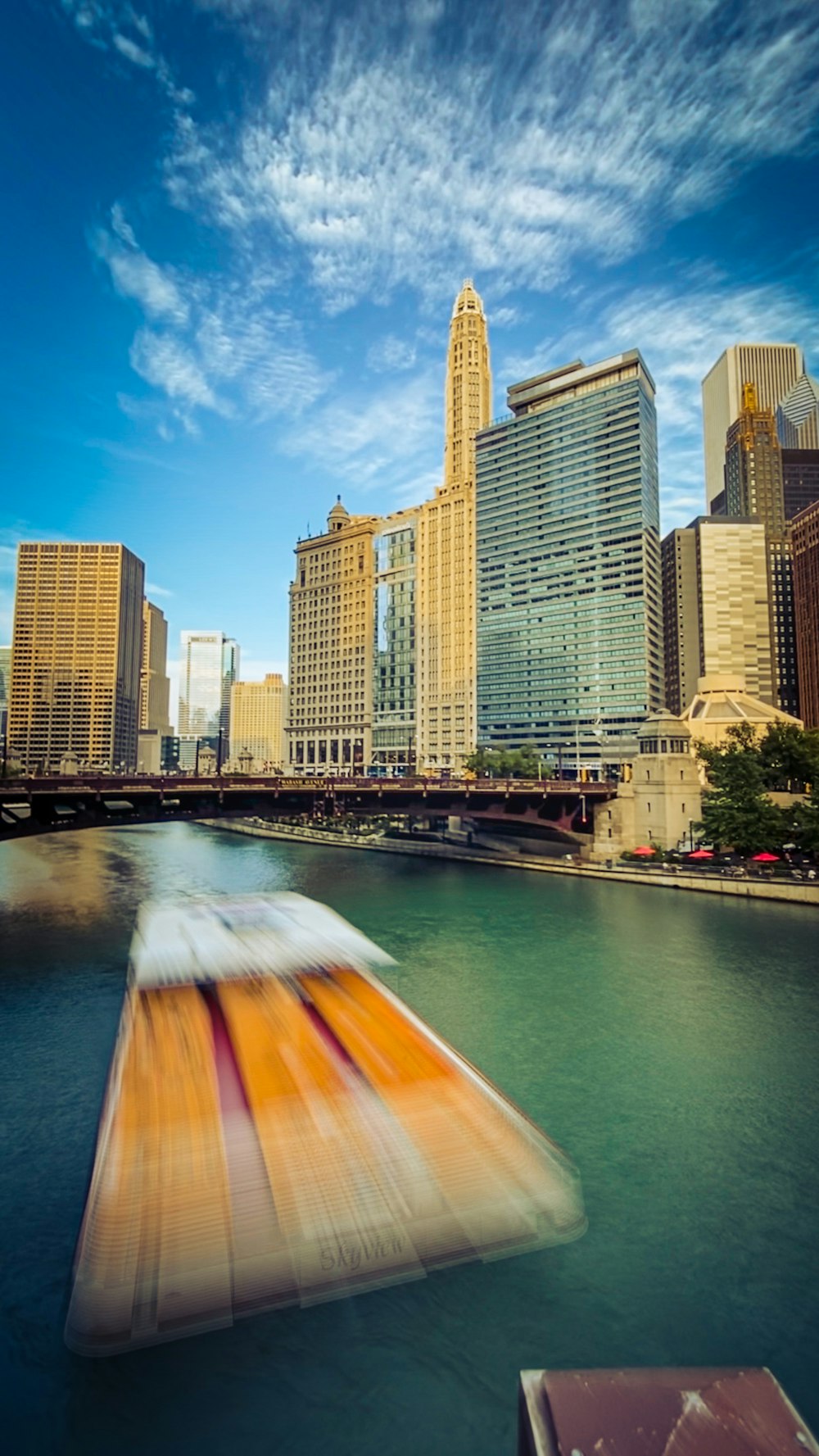 high rise buildings near river during daytime