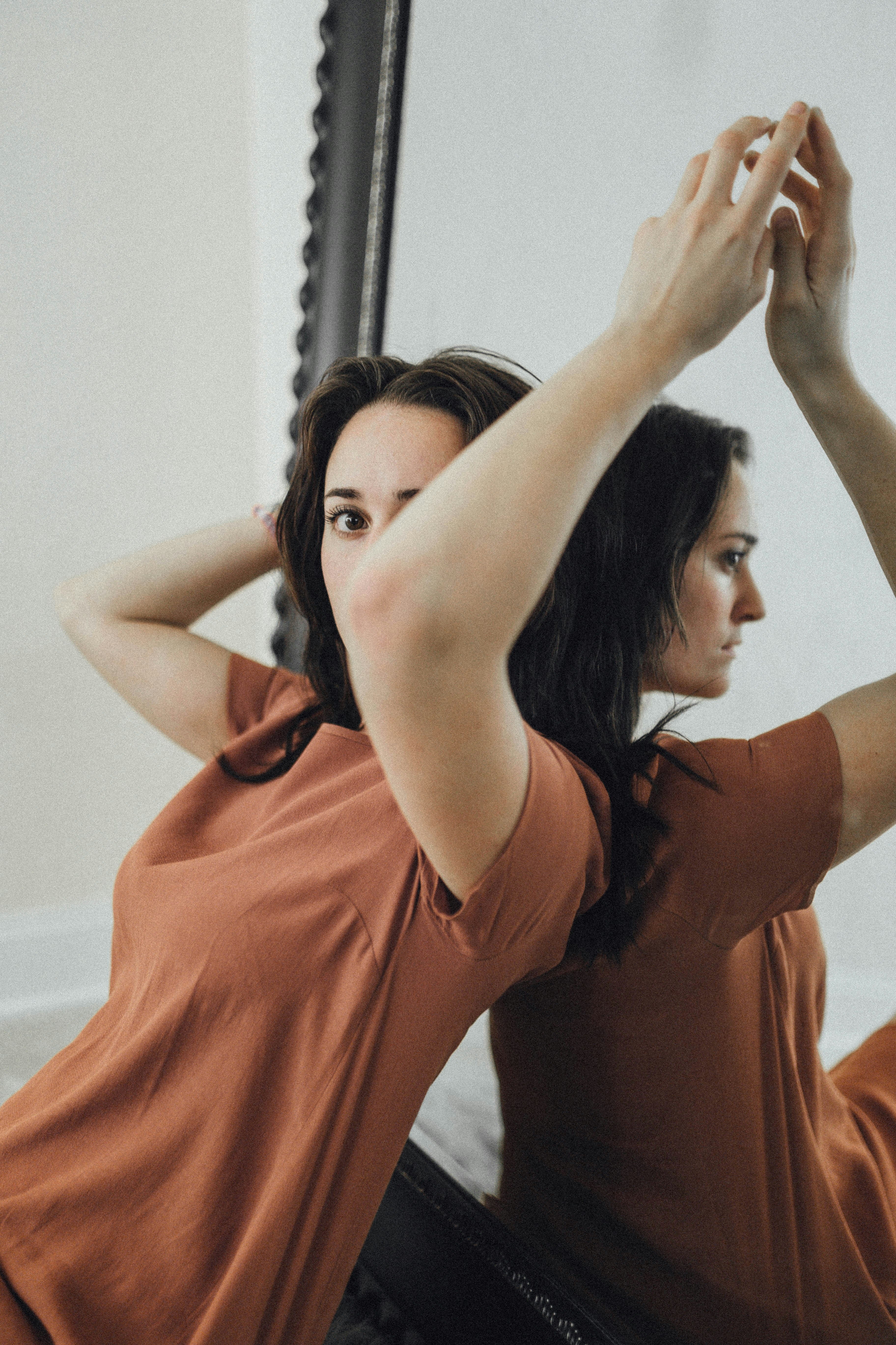 woman in orange sleeveless dress